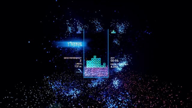 Screenshot: Das erste Level des Abenteuermodus von Tetris Effect, The Deep mit ordentlichem Partikelfeuerwerk